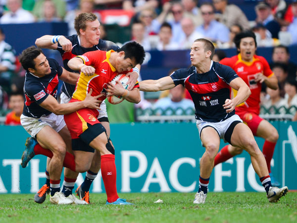 Team China plays against team Hong Kong at the 2012 Cathy Pacific/HSBC Hong Kong Sevens last March. The Chinese men's team failed to make the top three at the HSBC Asian Sevens Series last year, which means it will miss the event this year. China is trying to turn its program around in time for the sport's Olympic debut. Still a long road for rugby