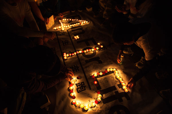 Beijing marathon lovers mourn Boston victims