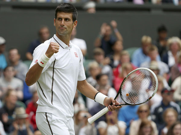 Novak Djokovic of Serbia celebrates after defeating Florian Mayer of Germany in their men's singles tennis match at the Wimbledon Tennis Championships, in London June 25, 2013. Djokovic, Williams, and China's Li win openers