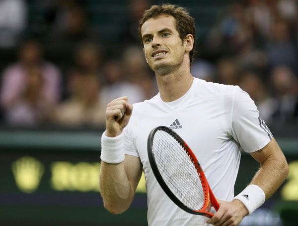 Andy Murray of Britain reacts after defeating Tommy Robredo of Spain in their men's singles tennis match at the Wimbledon Tennis Championships, in London June 28, 2013. World No 2 Murray cruises to last 16