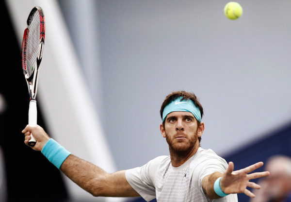 Juan Martin Del Potro of Argentina hits a shot during the men's singles final match against Novak Djokovic of Serbia at the Shanghai Masters tennis tournament October 13, 2013. Djokovic retains Shanghai Masters title