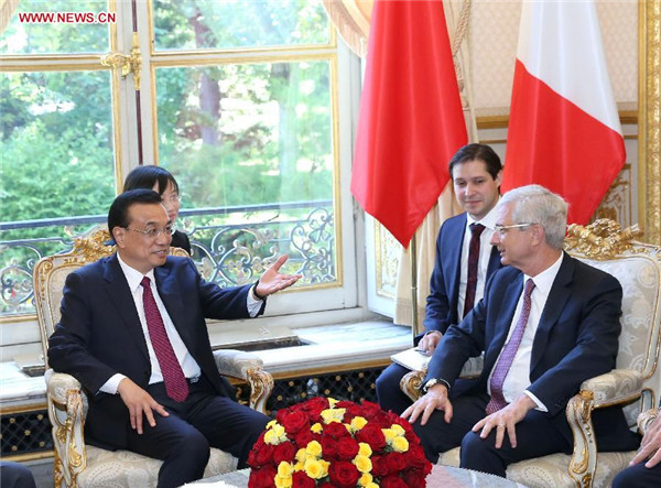 Li calls for closer parliamentary exchanges with France