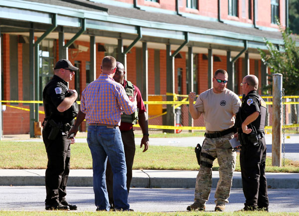 Teen kills father, opens fire on South Carolina schoolyard