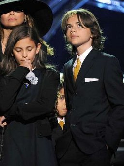 Jackson's kids emerge from behind the veil